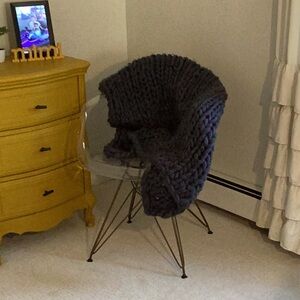 Posh grey chunky cable knit throw to elevate any room.